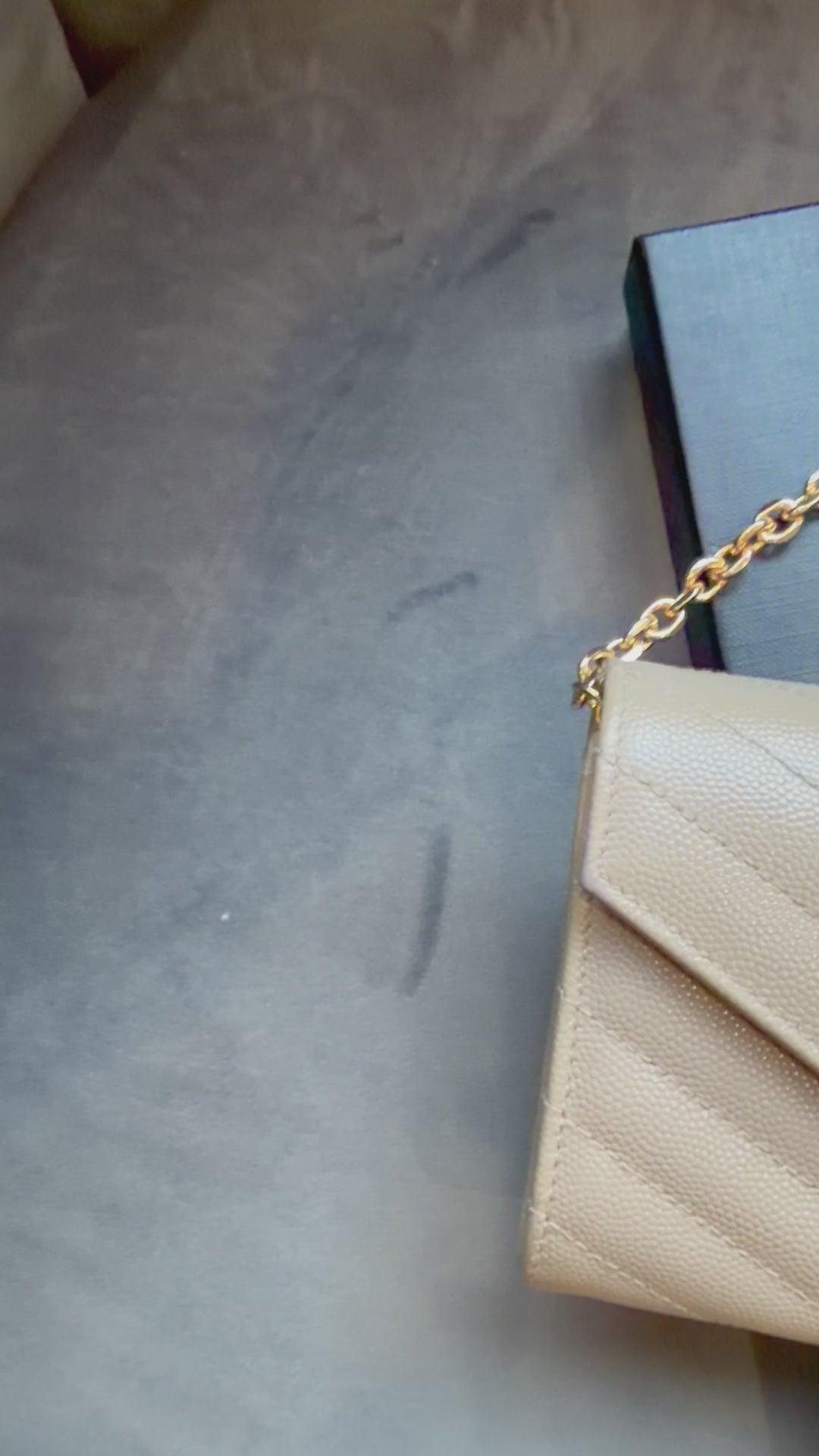 Yves Saint Laurent beige cassandre envelope flap wallet on chain
